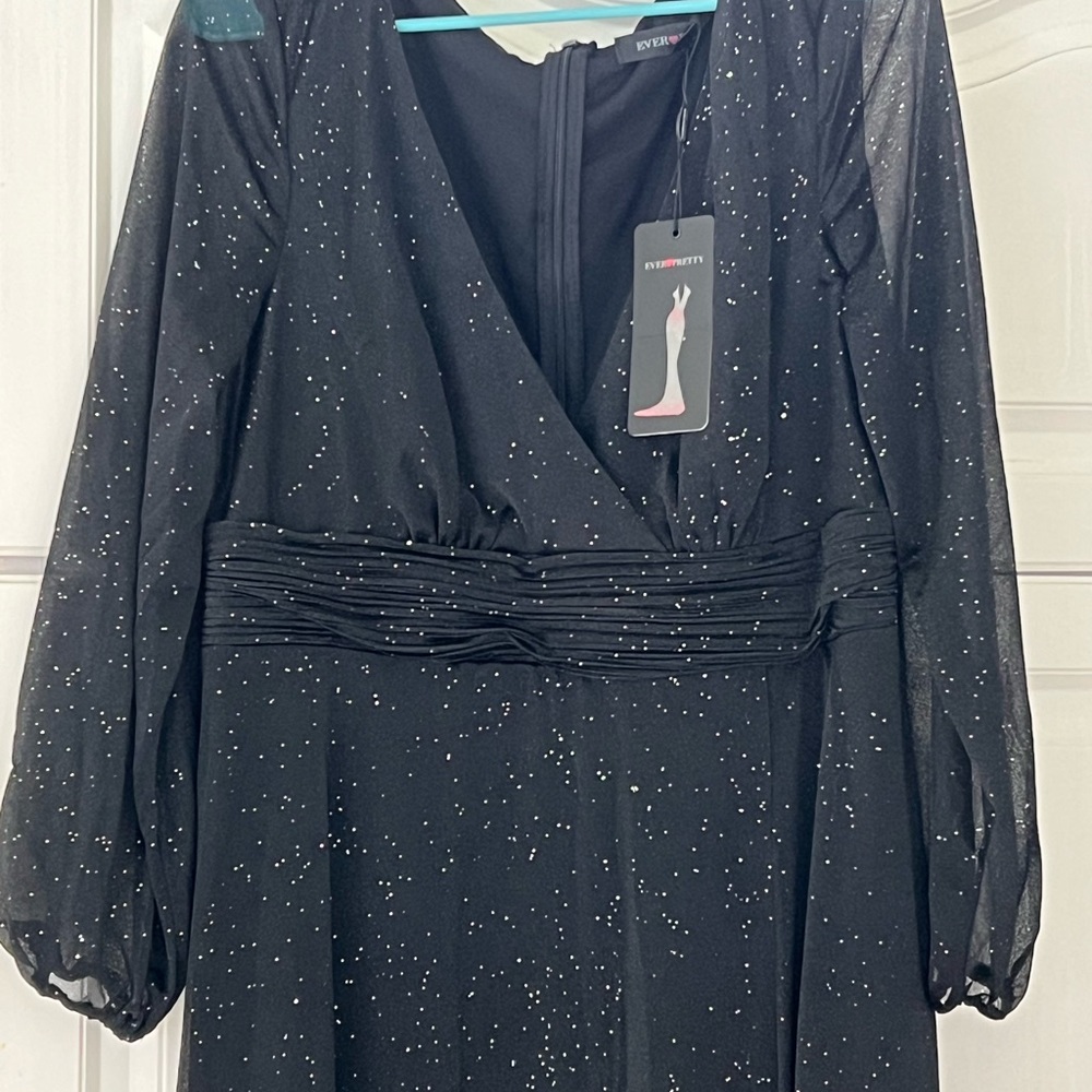 Black sparkly women’s size dress. Never worn